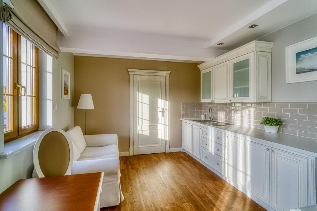 Kuchyň nebo kuchyňský kout v ubytování Perla Mare Apartamenty