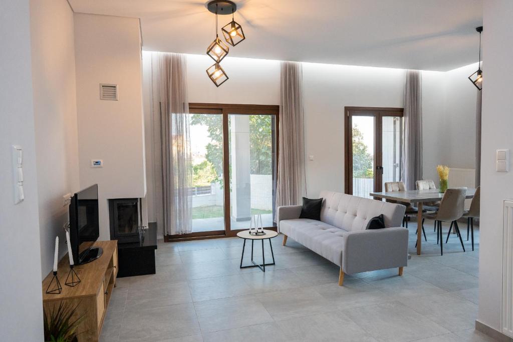 TV a/nebo společenská místnost v ubytování Orion Residence Ι