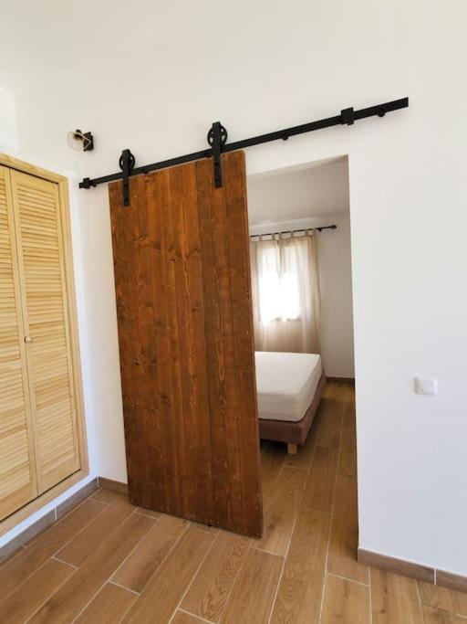 Postel nebo postele na pokoji v ubytování Rêve en Lubéron