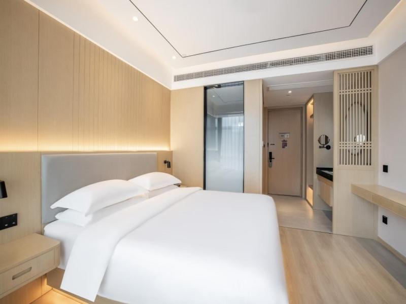 Deep Sleep Hotel Hangzhou Dajiang East Haide Xingang Center, Χανγκζού –  Ενημερωμένες τιμές για το 2023