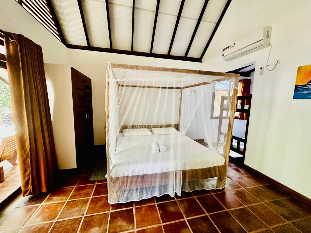 Postel nebo postele na pokoji v ubytování Riva del Sole Guest House
