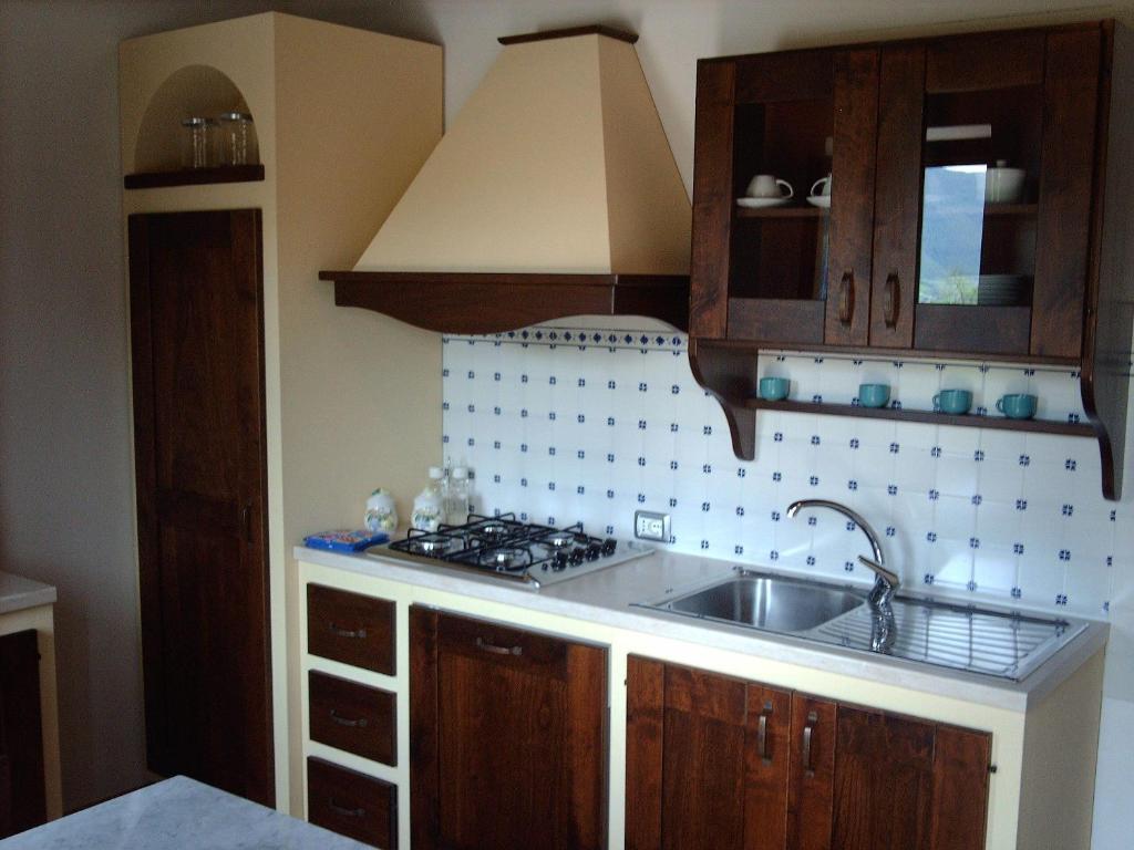 Kuchyň nebo kuchyňský kout v ubytování Il Vigneto