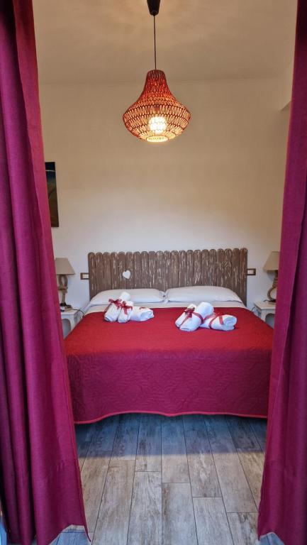 A bed or beds in a room at Il Mare Di Roma