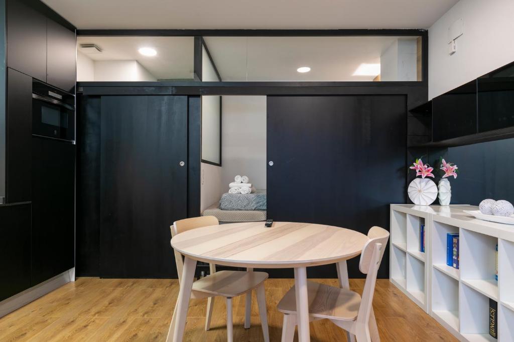 Kuchyň nebo kuchyňský kout v ubytování HOMEABOUT MADRID RÍO APARTMENT