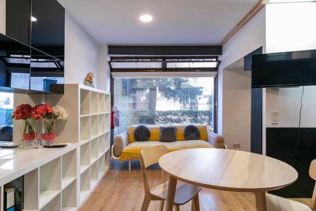 Kuchyň nebo kuchyňský kout v ubytování HOMEABOUT MADRID RÍO APARTMENT