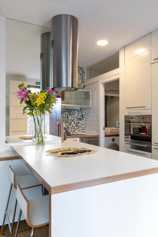 Kuchyň nebo kuchyňský kout v ubytování HOMEABOUT MADRID RÍO APARTMENT