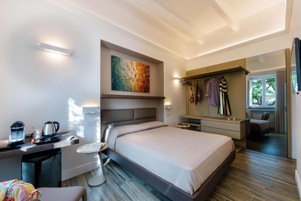 Postel nebo postele na pokoji v ubytování AGAVE B&B