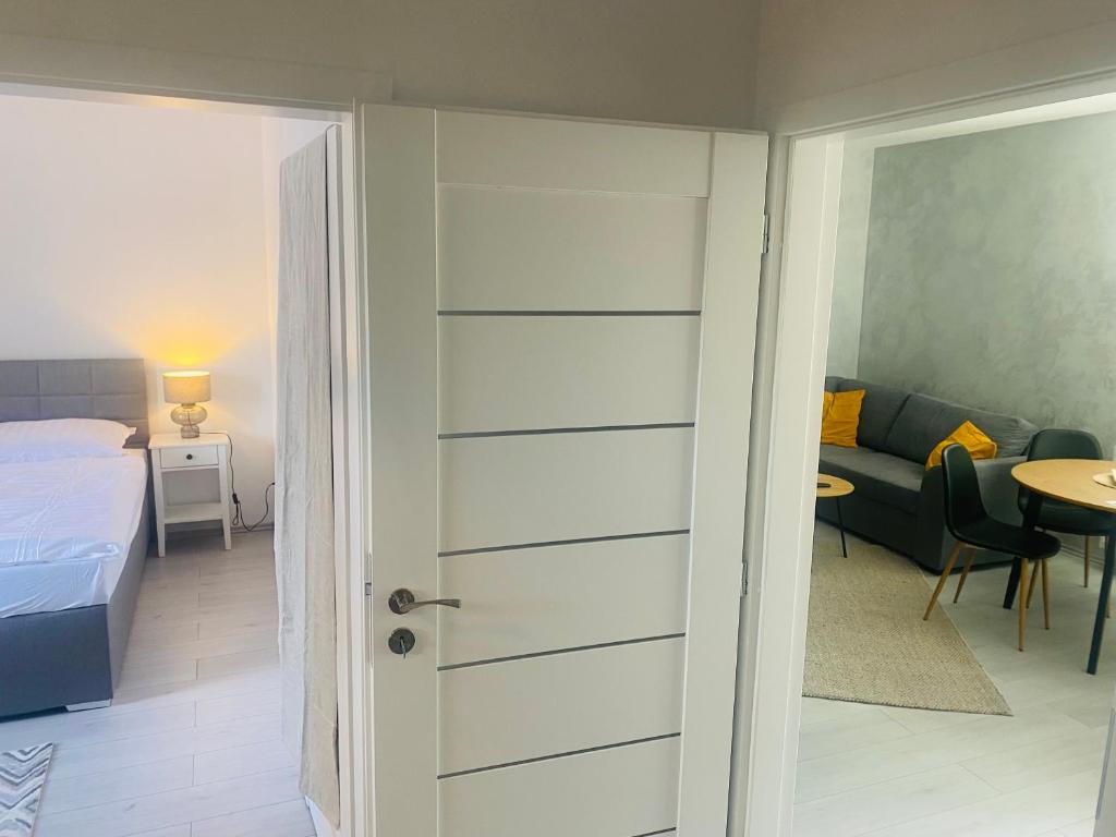 Postel nebo postele na pokoji v ubytování Maja apartman