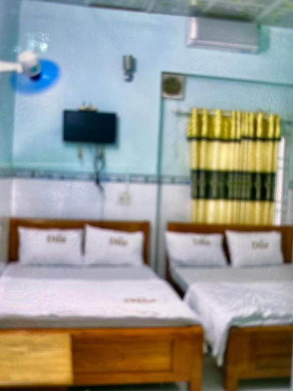 Ένα ή περισσότερα κρεβάτια σε δωμάτιο στο Vân tiến