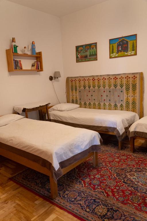 Postel nebo postele na pokoji v ubytování Kolory Guest House