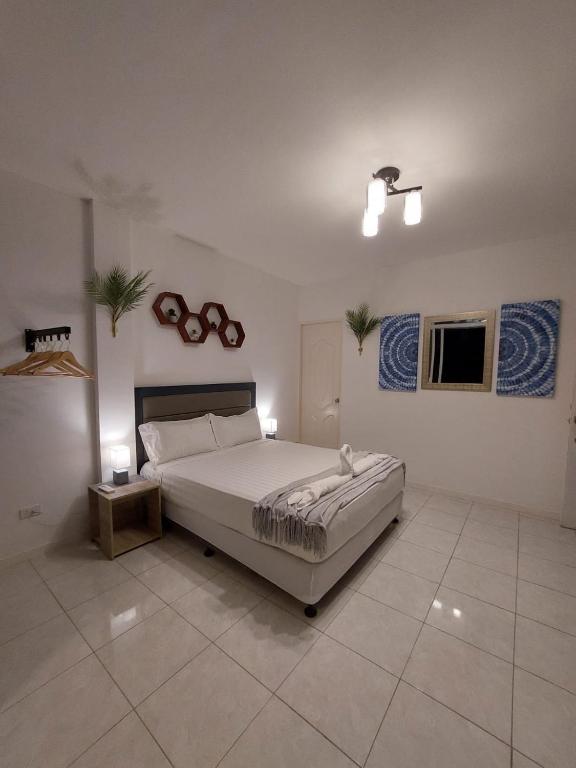 Postel nebo postele na pokoji v ubytování Bonsai Jacuzzi Suites