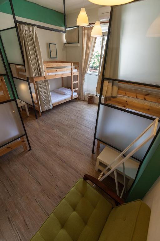 Postel nebo postele na pokoji v ubytování Sleeping Boot Hostel