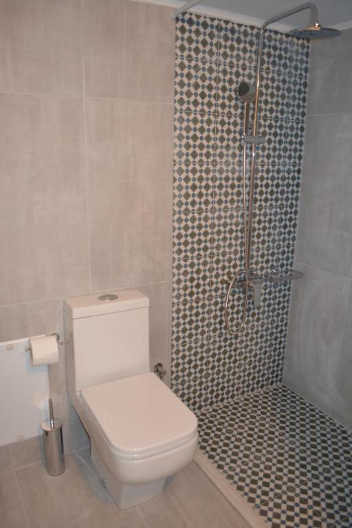 A bathroom at Kalypso Studios & Rooms