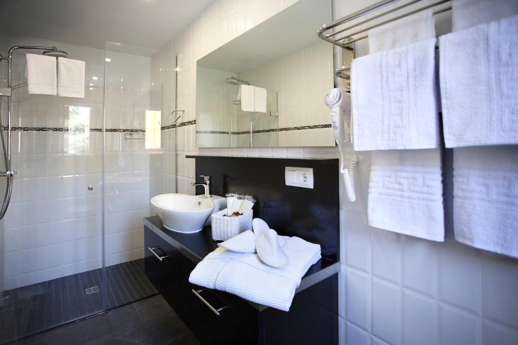 Koupelna v ubytování Hotel Cupidor