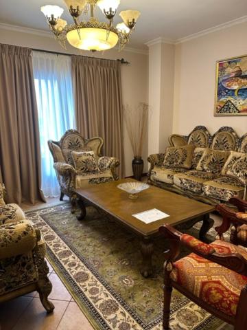 Posezení v ubytování Dinasty Hotel