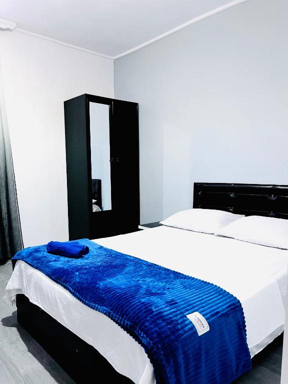 Llit o llits en una habitació de Hotel Sunny