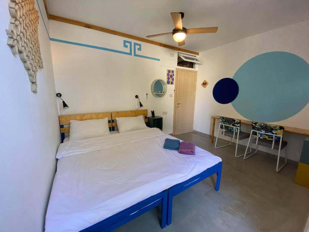 Postel nebo postele na pokoji v ubytování Odem Guest House