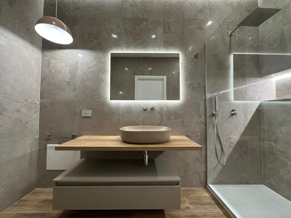 Koupelna v ubytování Alma Rooms