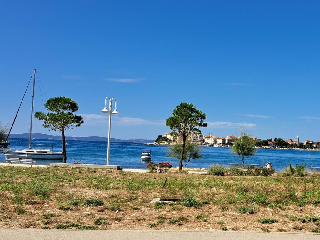 a view of a body of water with boats at Apartments Babic in Podstrana