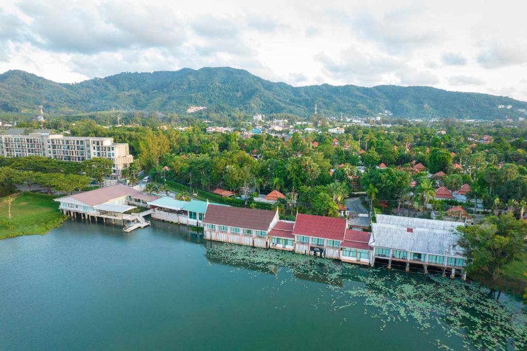 an aerial view of a town on a river at Chabana Resort Bang-tao Beach Phuket- SHA Extra Plus in Bang Tao Beach