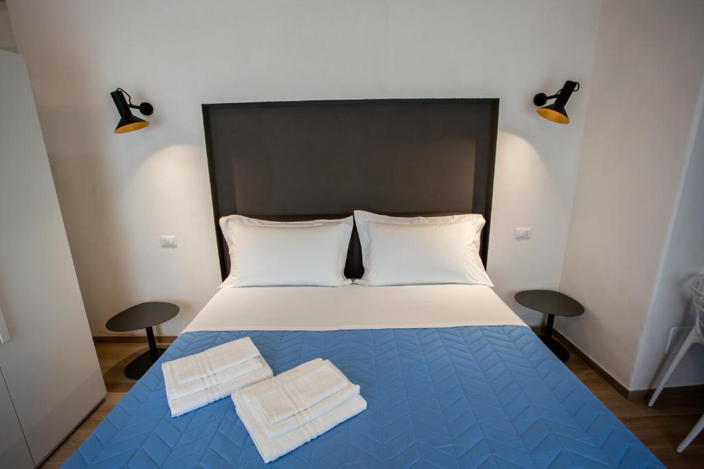 Postel nebo postele na pokoji v ubytování Casa Nera GuestHouse