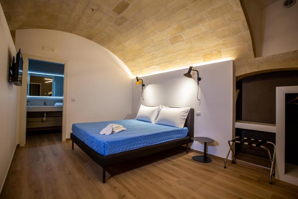 Postel nebo postele na pokoji v ubytování Casa Nera GuestHouse