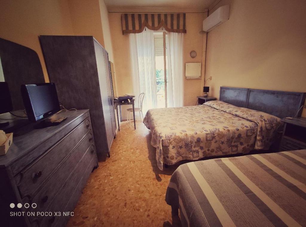 Postel nebo postele na pokoji v ubytování Hotel Delhy