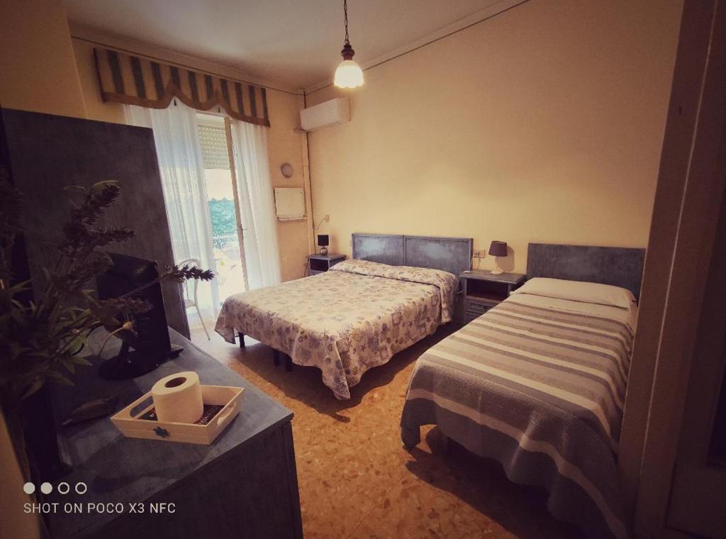 Postel nebo postele na pokoji v ubytování Hotel Delhy