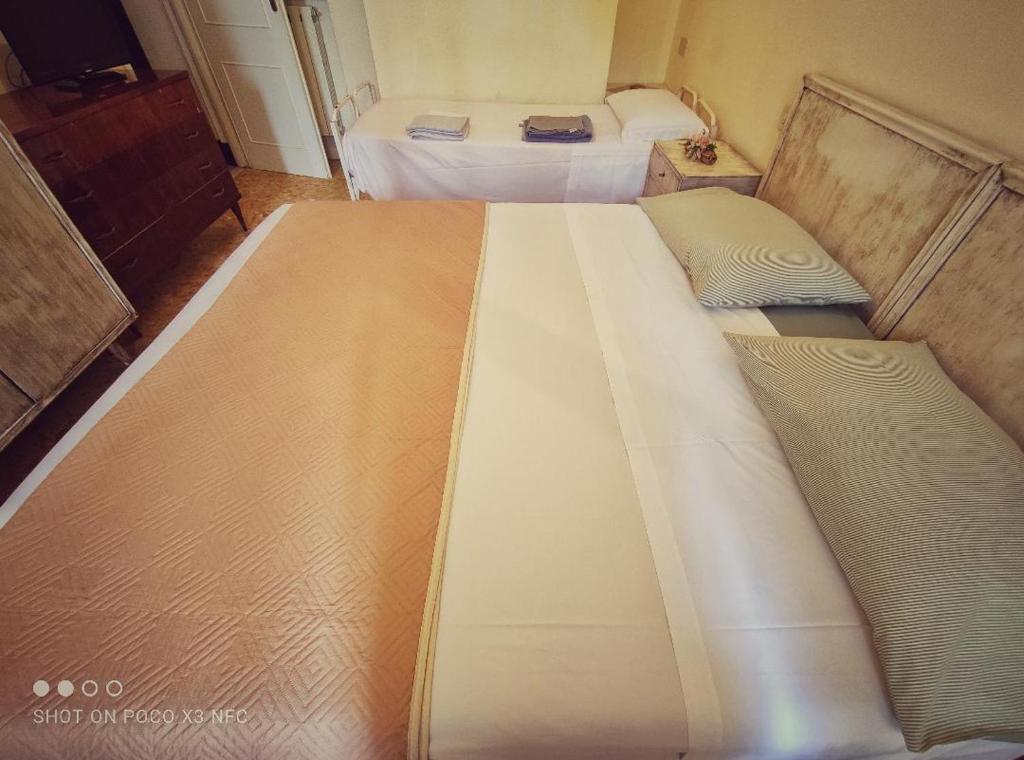 Postel nebo postele na pokoji v ubytování Hotel Delhy