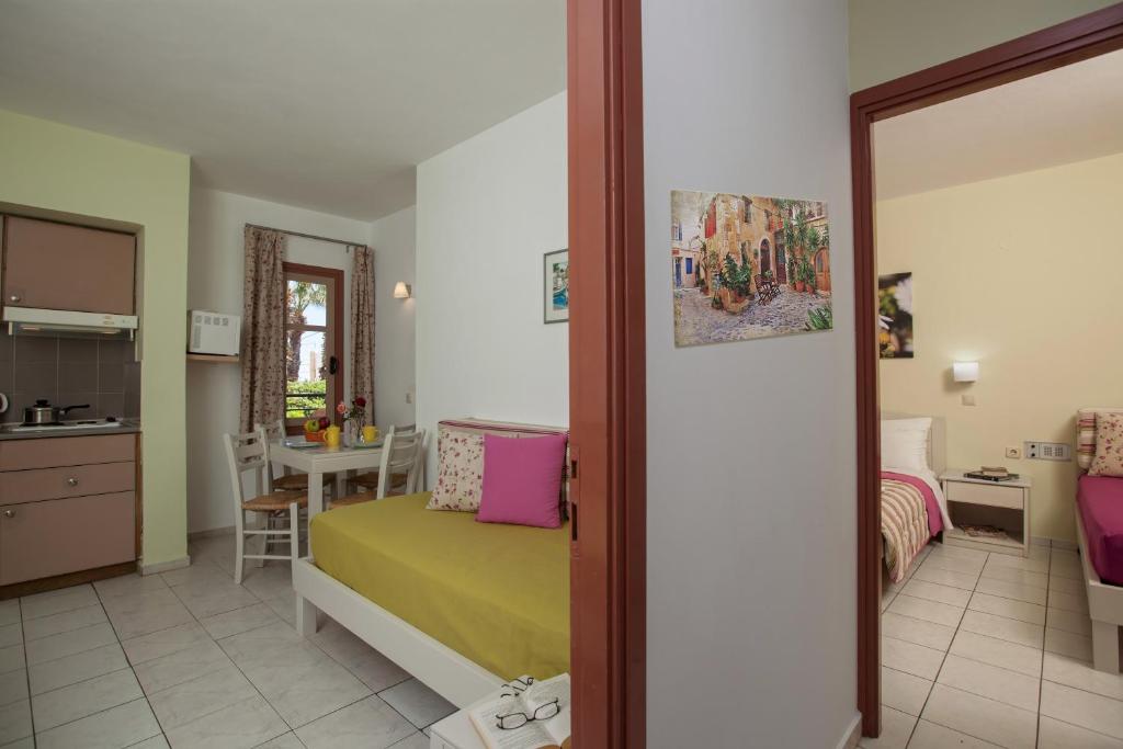 Kuchyň nebo kuchyňský kout v ubytování Latania Apartments