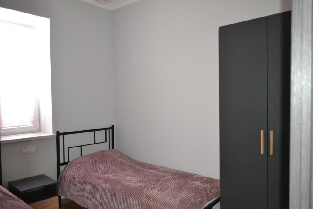 Postel nebo postele na pokoji v ubytování Sunny Lodge Dilijan