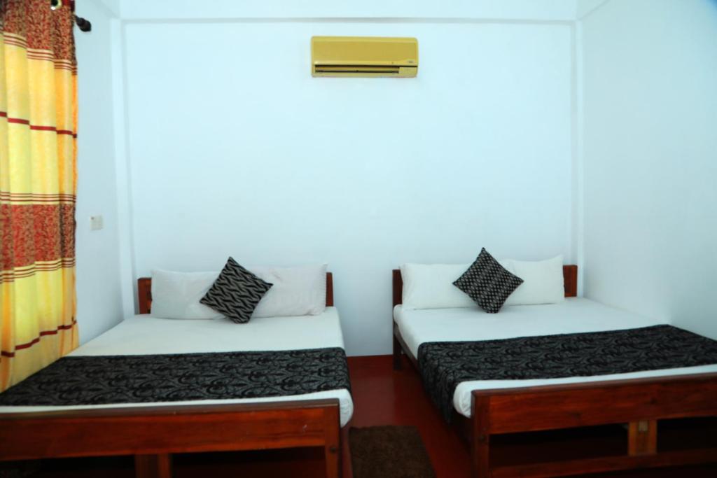 Postel nebo postele na pokoji v ubytování White Diamond Resort