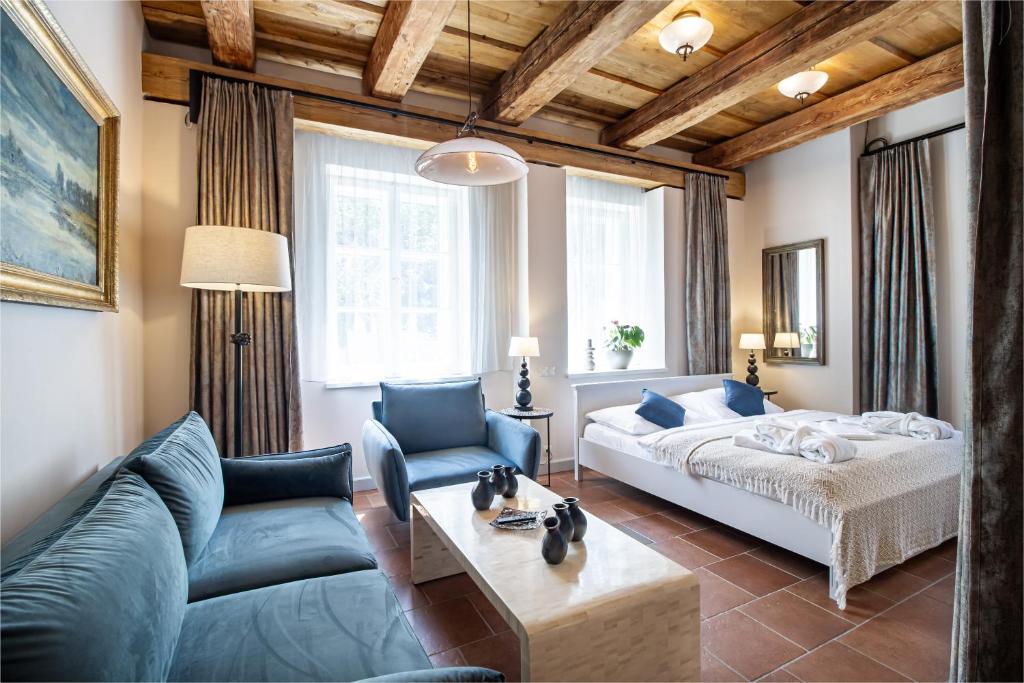 Ένα ή περισσότερα κρεβάτια σε δωμάτιο στο Apartmány Šupina