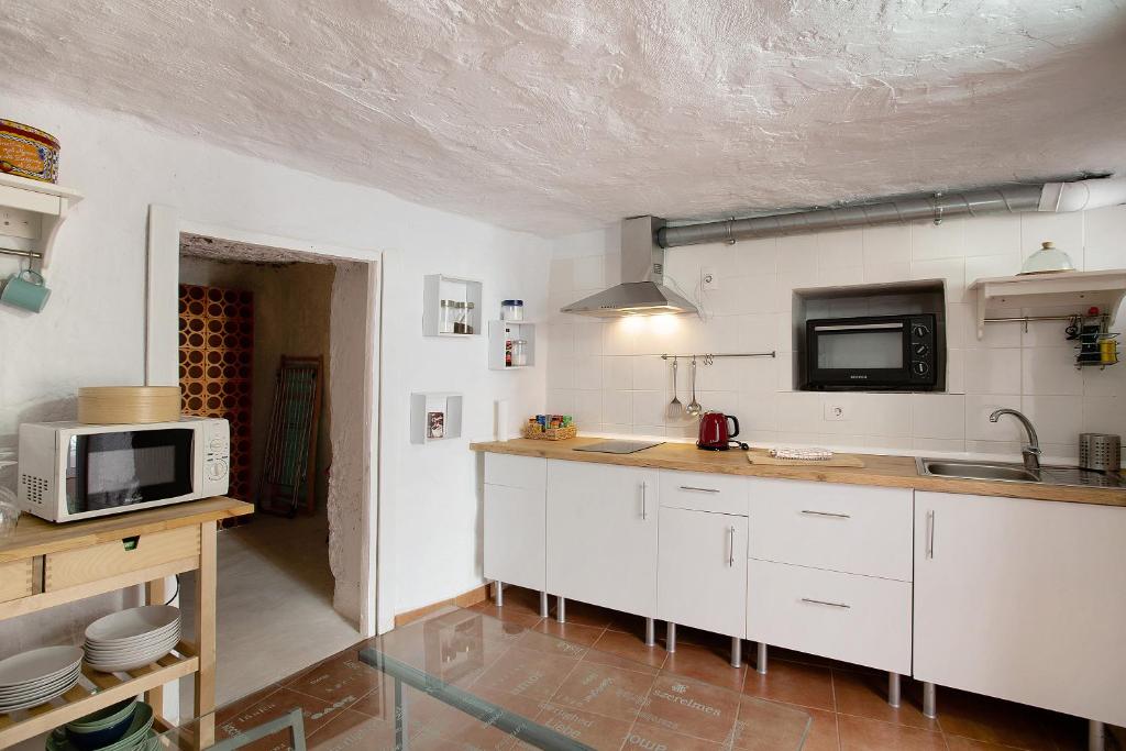 Kuchyň nebo kuchyňský kout v ubytování Casa Cueva Tejeda 2 dorm