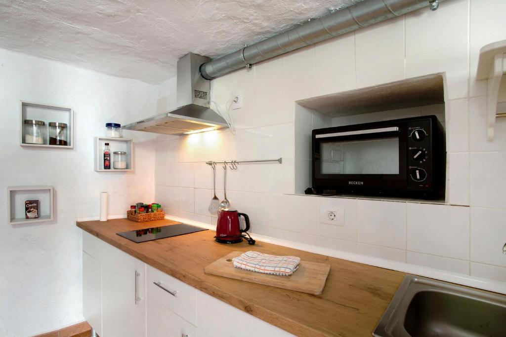 Kuchyň nebo kuchyňský kout v ubytování Casa Cueva Tejeda 2 dorm