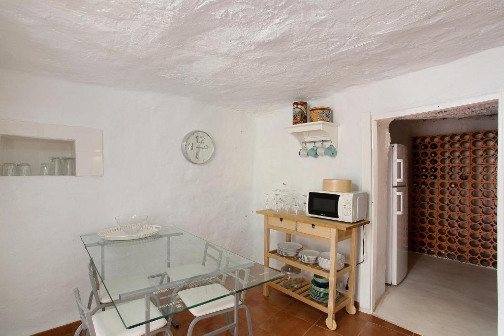TV a/nebo společenská místnost v ubytování Casa Cueva Tejeda 2 dorm
