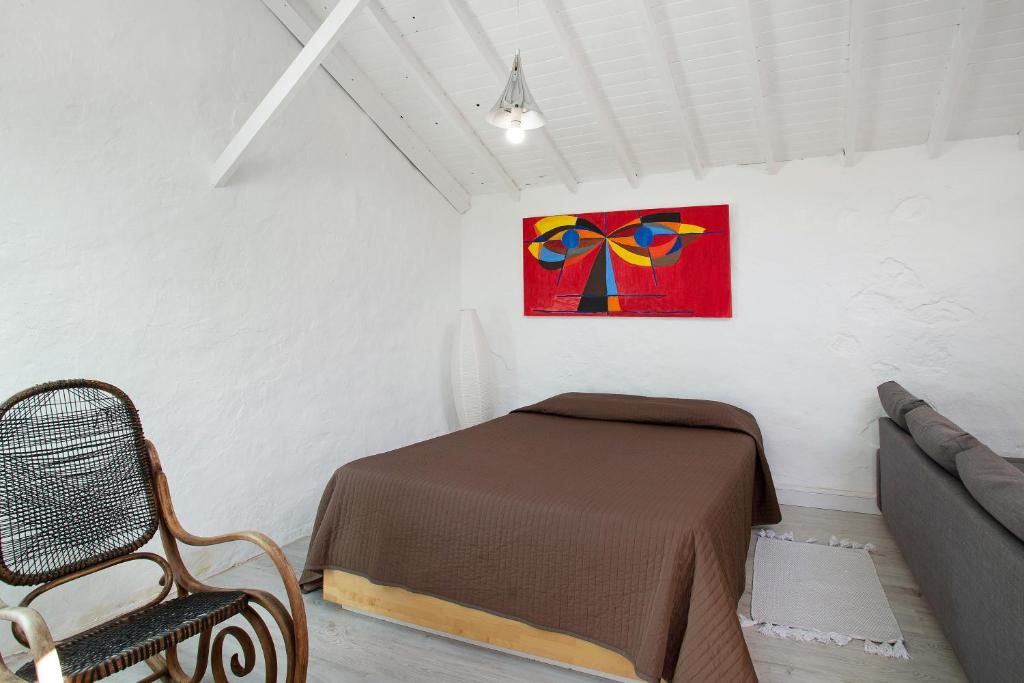 Postel nebo postele na pokoji v ubytování Casa Cueva Tejeda 2 dorm