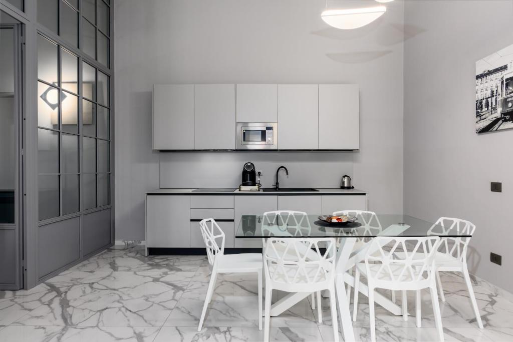 Η κουζίνα ή μικρή κουζίνα στο Q71 TIMELESS SUITES