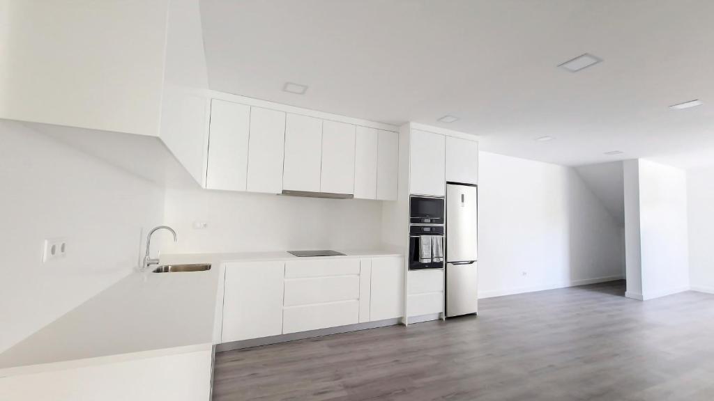 Kuchyň nebo kuchyňský kout v ubytování Villa Oceânica by LovelyStay