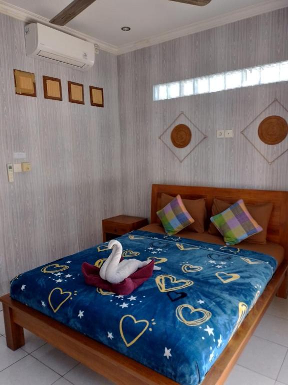 Postel nebo postele na pokoji v ubytování Nami House