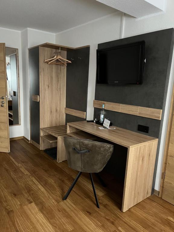 TV a/nebo společenská místnost v ubytování Gasthaus Waldschlosschen