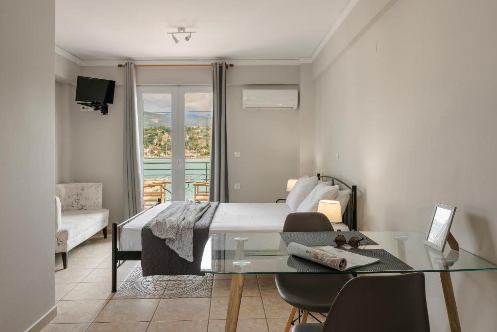 Łóżko lub łóżka w pokoju w obiekcie Fidias city rooms