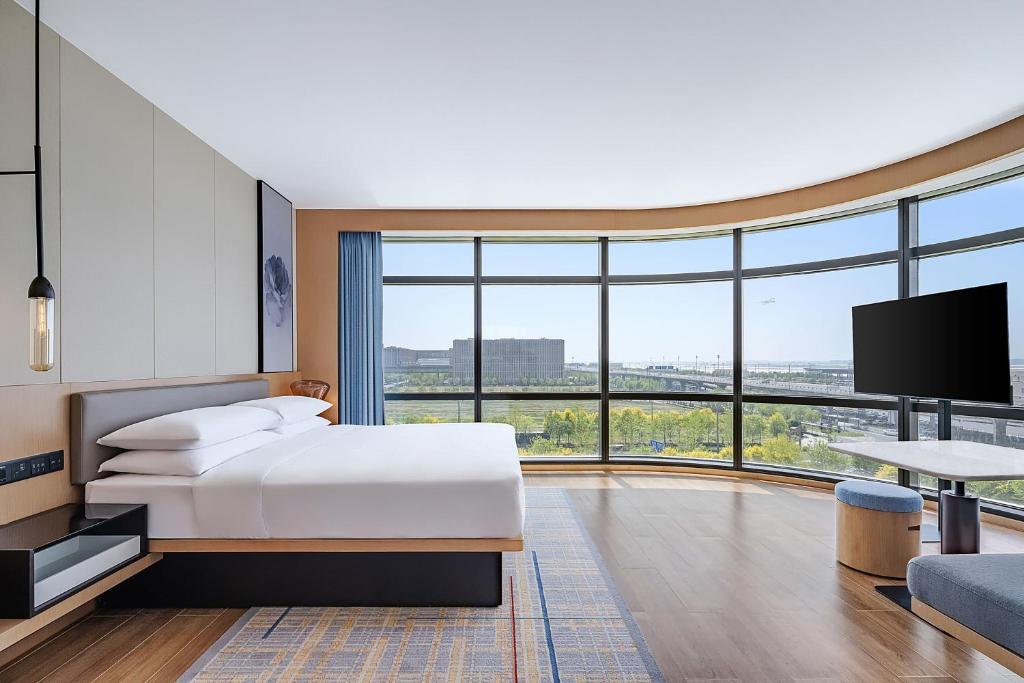 Postel nebo postele na pokoji v ubytování Fairfield by Marriott Beijing Daxing Airport
