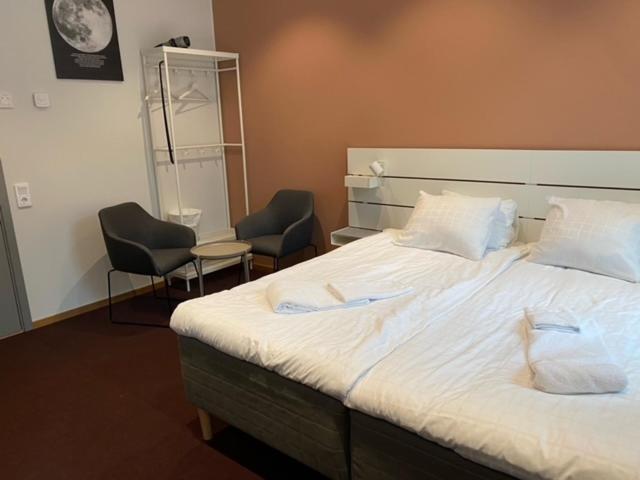Postel nebo postele na pokoji v ubytování Ahlgrens Hotell Bed & Breakfast