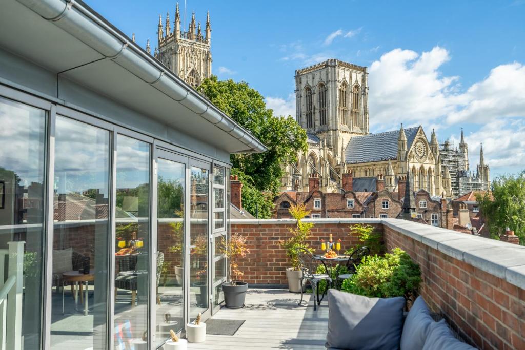a view of the cathedral from the balcony of a building at 11 Stonegate Court in York