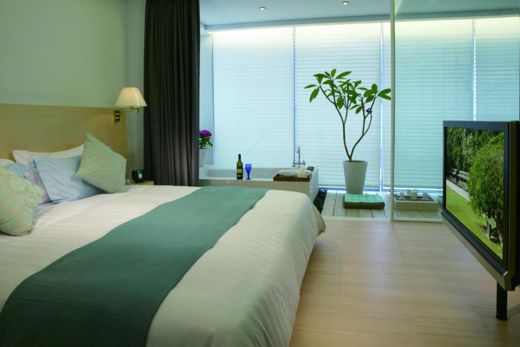 Postel nebo postele na pokoji v ubytování Hotel Double One
