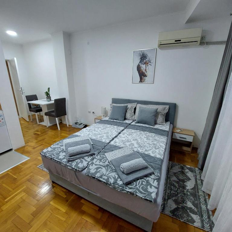 Postel nebo postele na pokoji v ubytování Apartman Tara