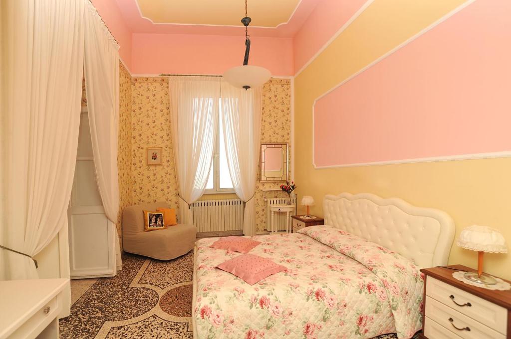 Ein Bett oder Betten in einem Zimmer der Unterkunft B&B La Panoramica