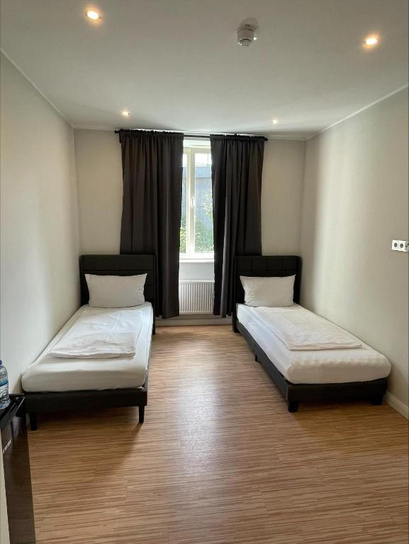 Postel nebo postele na pokoji v ubytování Ahoi Hostel