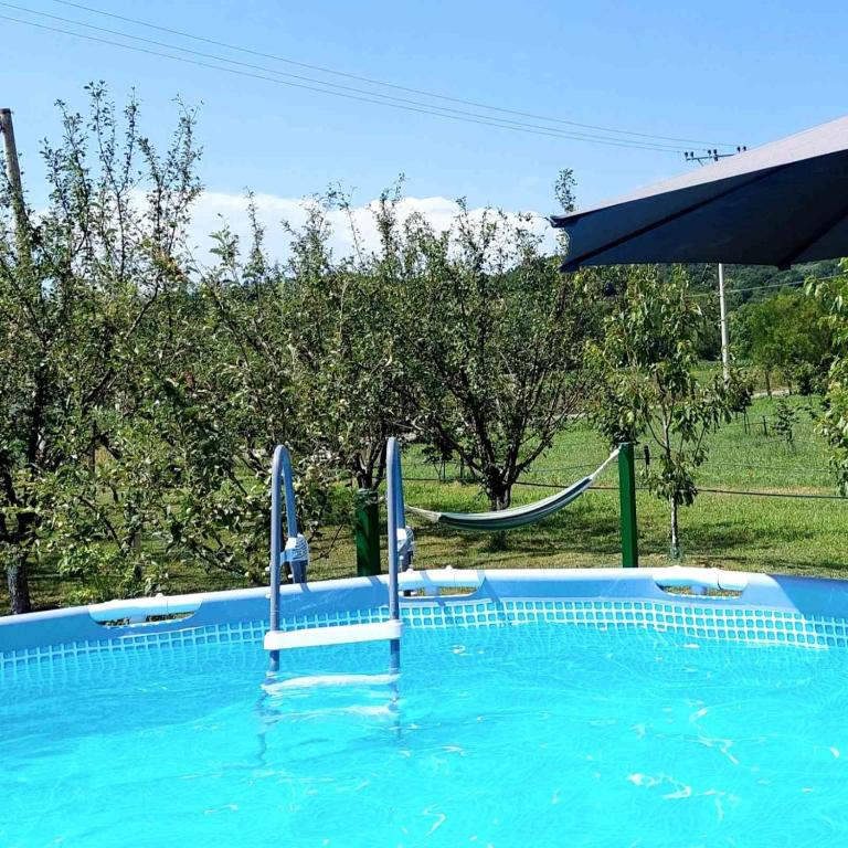 Bazén v ubytování Sunny Funny House nebo v jeho okolí